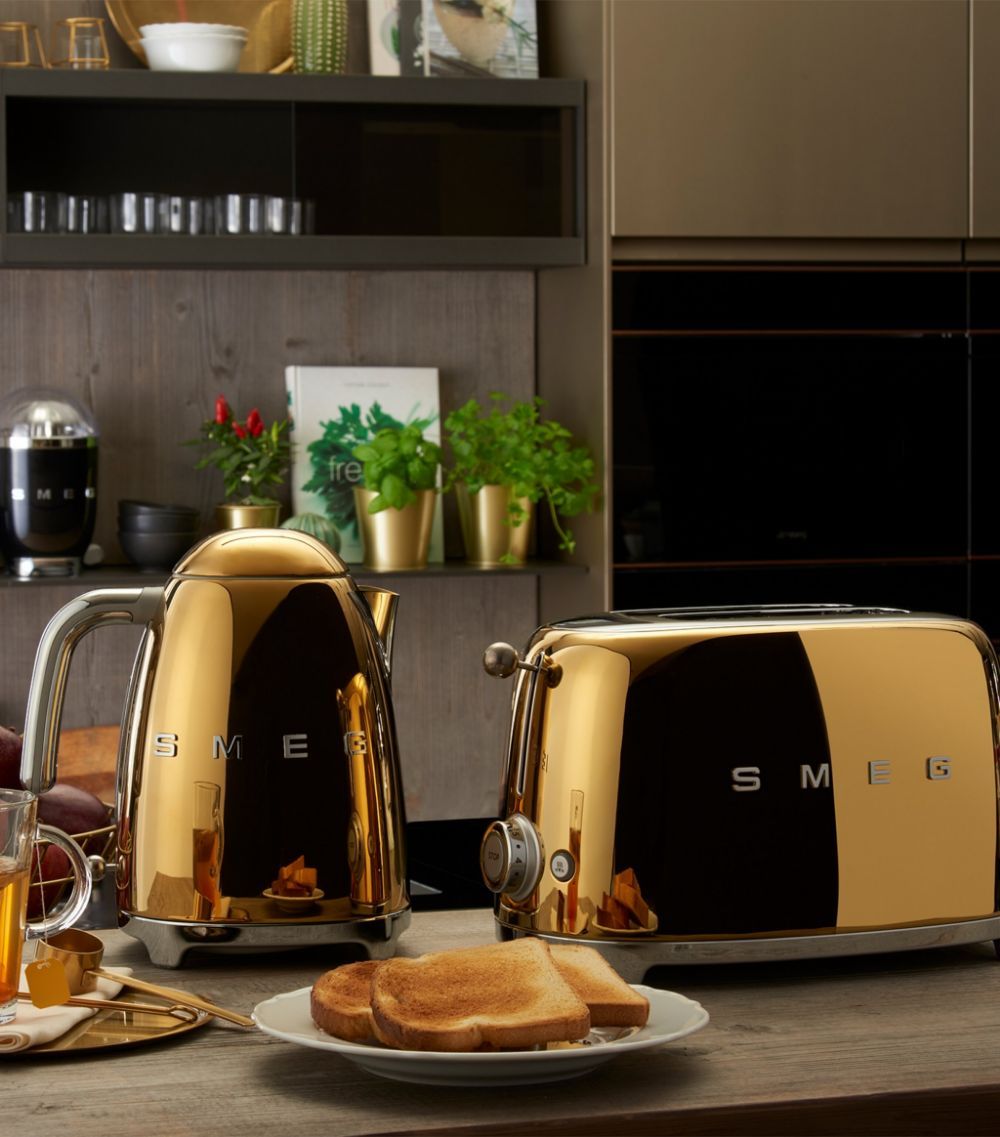shiny golden smag appliances in kitchen 